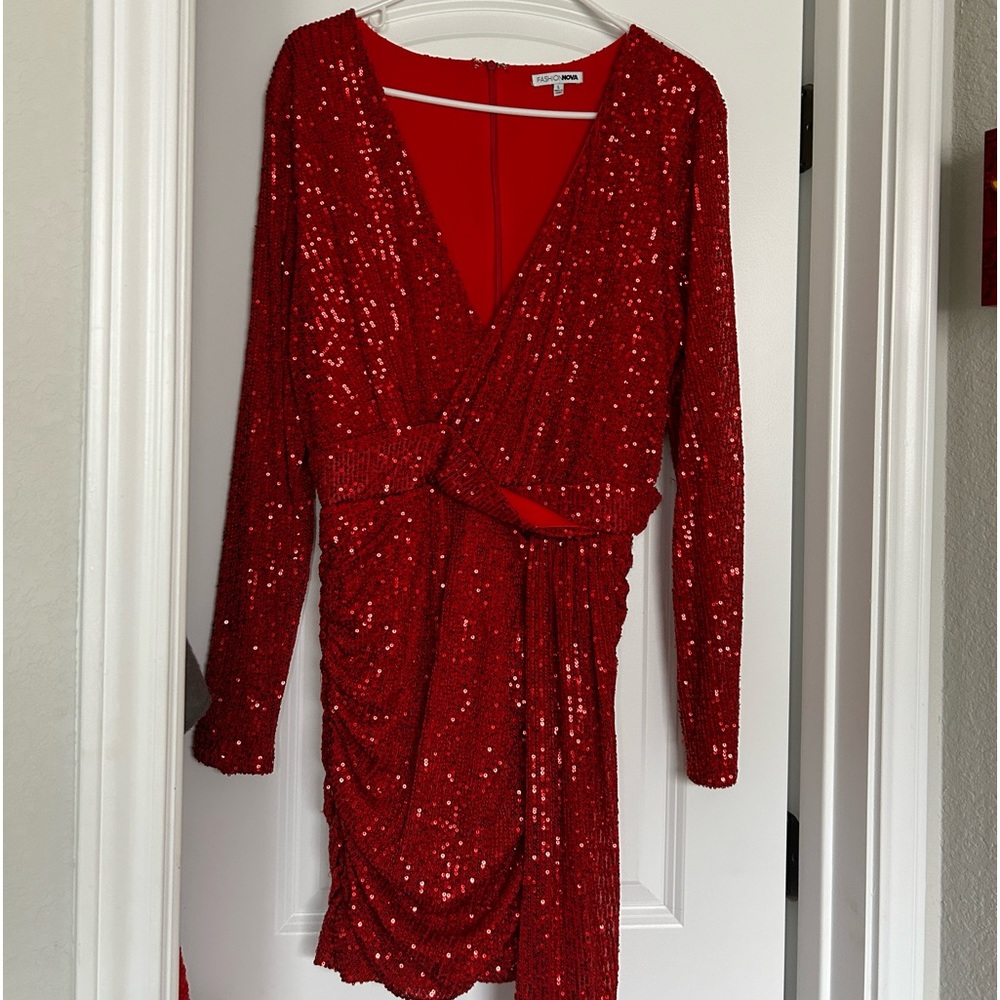 Fashionova dress. Only worn once, stretchy material, length right above knee.